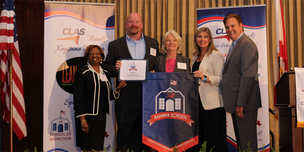 group photo of school and district staff receiving award group photo of school and district staff receiving award